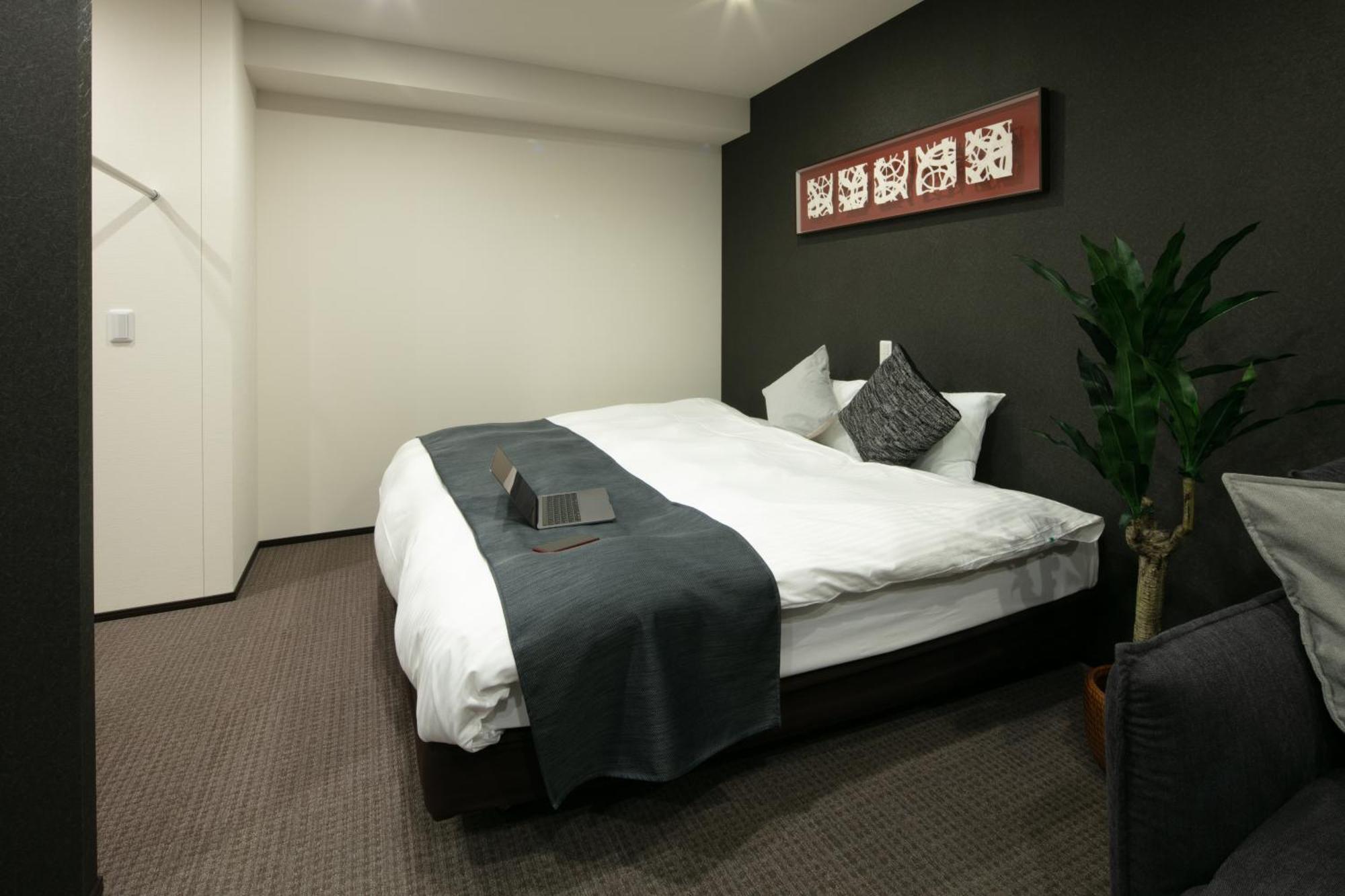 Randor Hotel Sapporo Suites Pokoj fotografie A room at the hotel