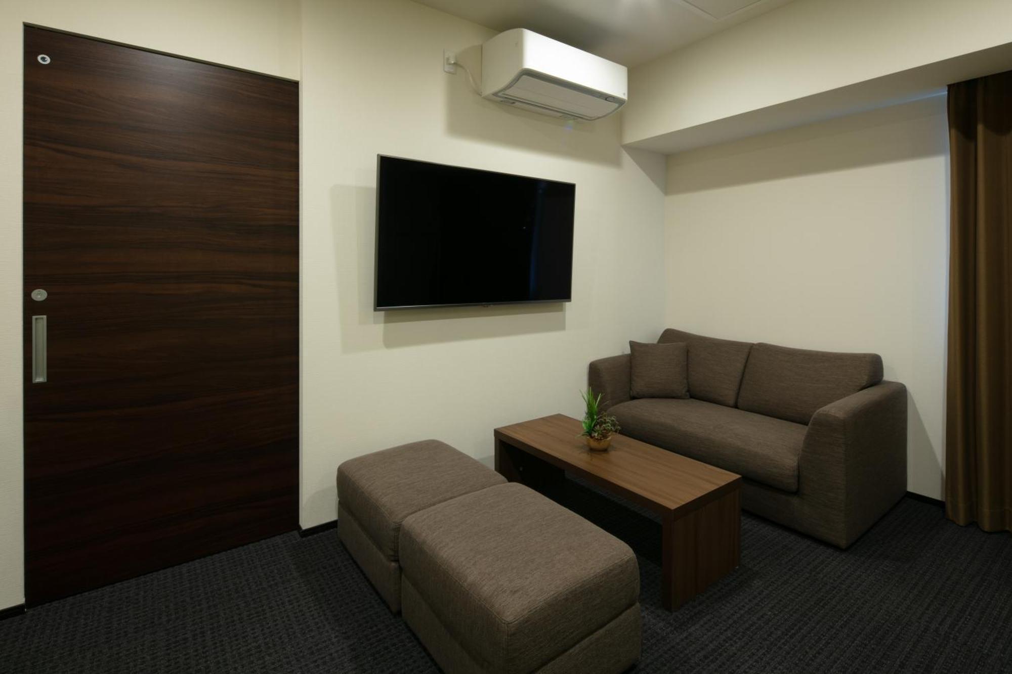 Randor Hotel Sapporo Suites Pokoj fotografie A room at the station